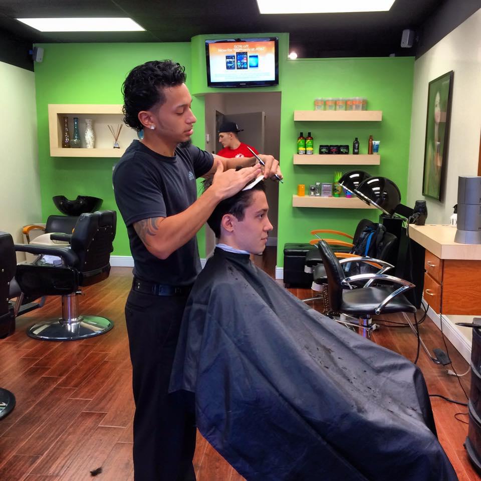 Izzy cutting hair at IzzyIzCuts
